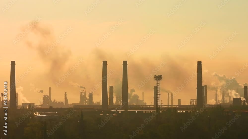 Heavy industry background. Fuming chimneys. Industrial landscape. Smoke tower background. Metallurgical factory. Air pollution and ecology. Global warming concept. Heavy industry background. Fuming chimneys. Industrial landscape. Smoke tower background. Metallurgical factory. Air pollution and ecology. Global warming concept.