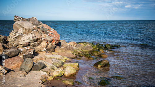 Cape Kolka with stones and Baltic sea, Kolka, Latvia.