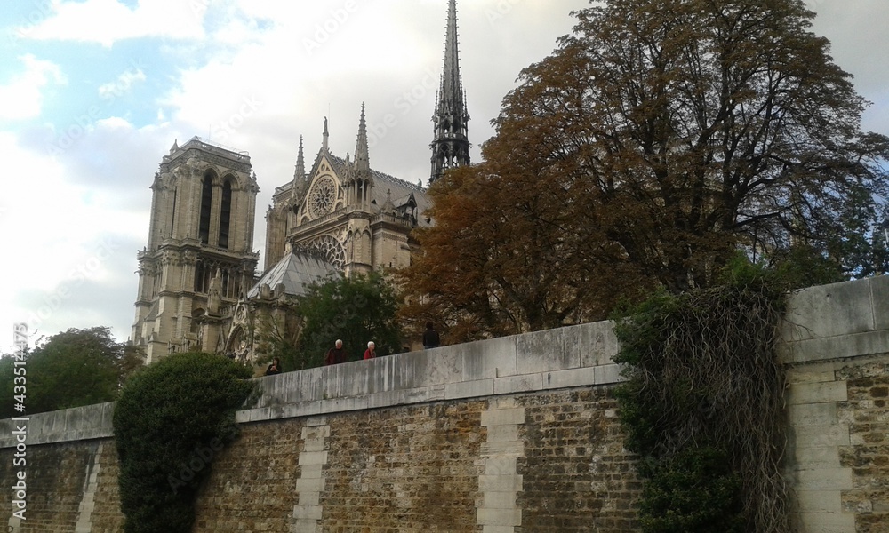 2015 year sigthseeing tour onleft notre cathedral. paris, france.