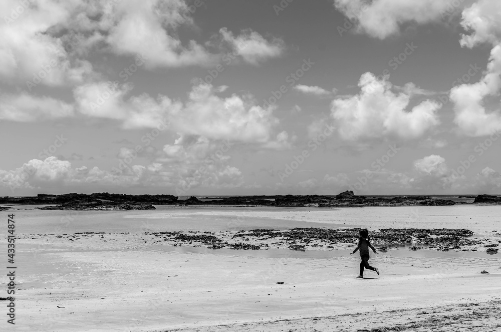 CHILD ON THE BEACH