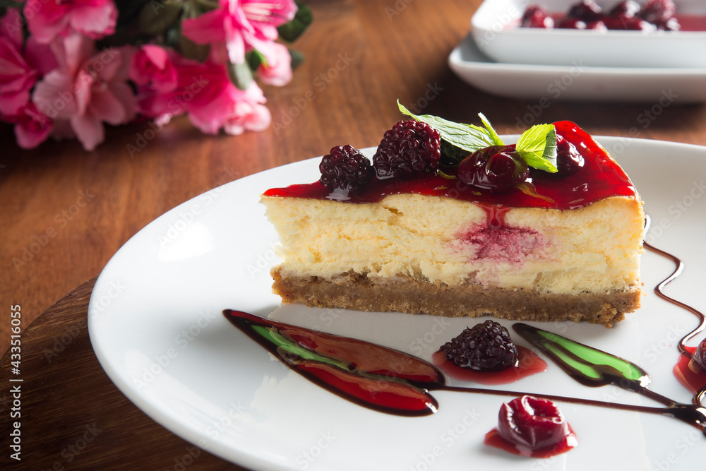 Cheesecake in a white plate. Front view Cheesecake in a white plate. Front view