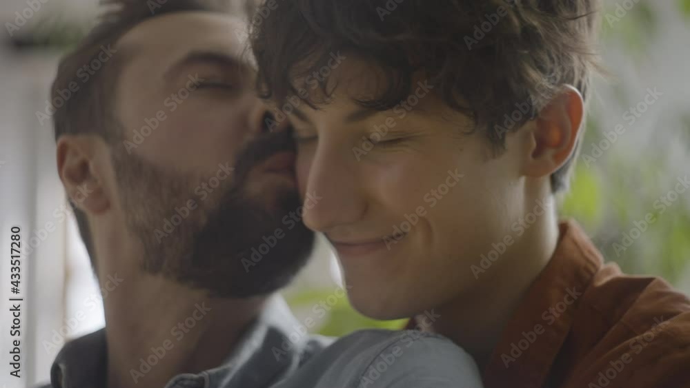 Happy boyfriends hugging and smiling together, romantic gay couple relationship Happy boyfriends hugging and smiling together, romantic gay couple relationship