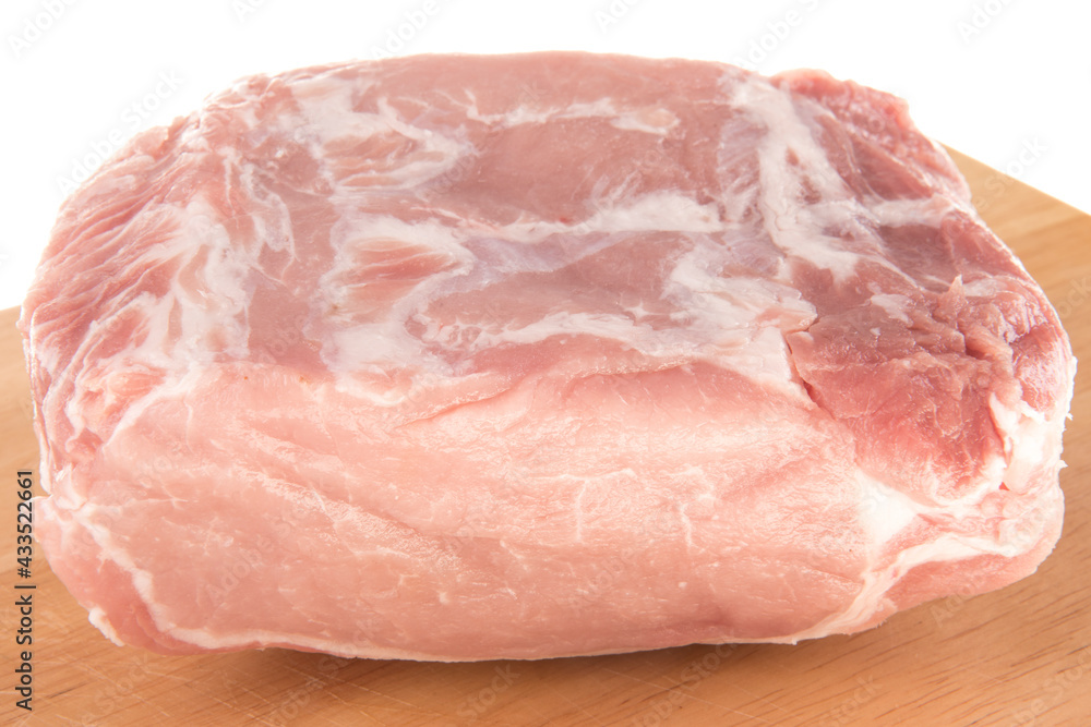 Pork fillet raw meat, close-up, isolated on white background Pork fillet raw meat, close-up, isolated on white background