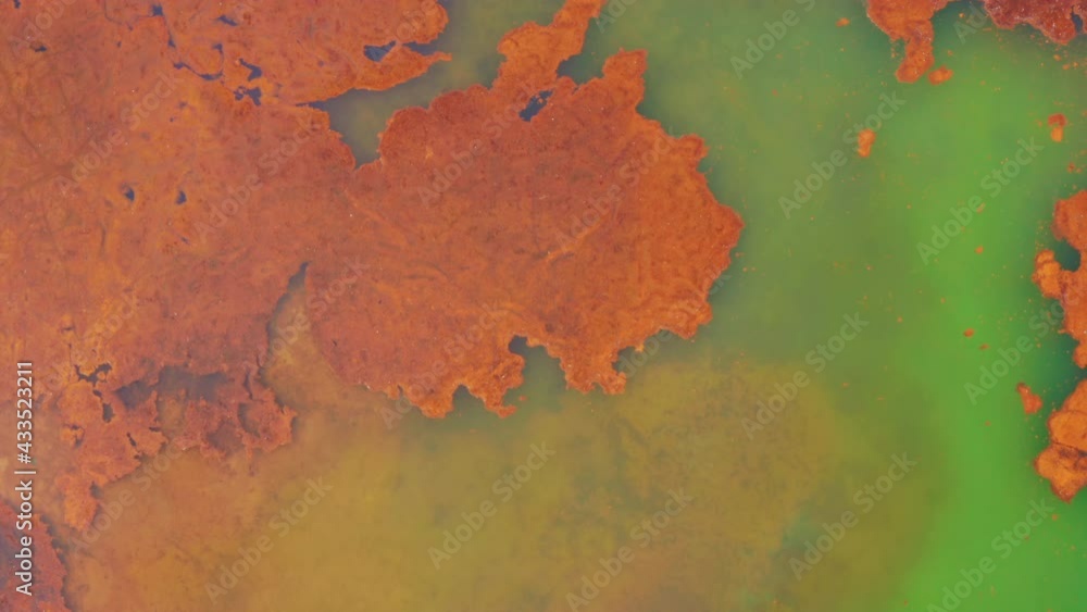 A toxic lake or river next to an industrial copper mine. Heavy metals ...