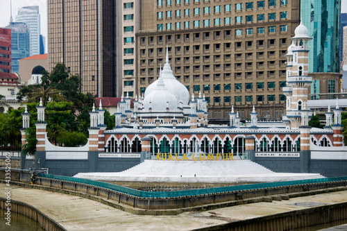 Photography The ornate Masjid Jamek (Friday Mosque) is situated on the bank of the Klang Riv