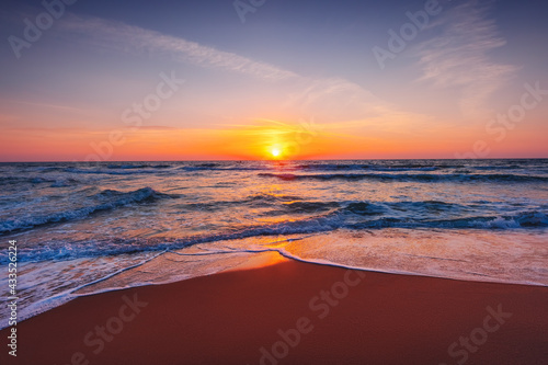 Beach sunrise over the sea © Gerisima
