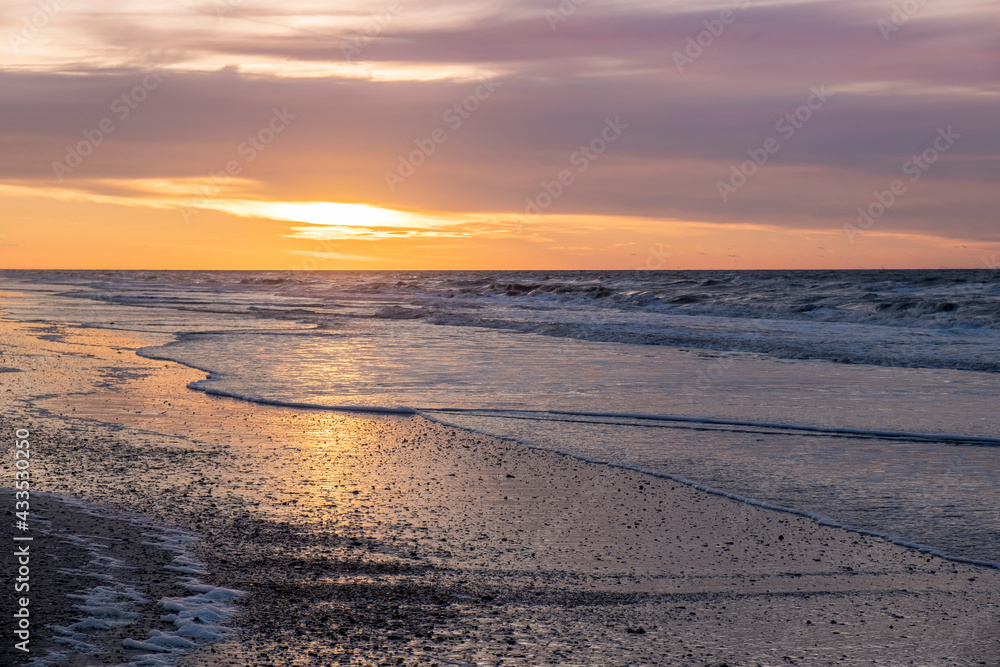Summer time on the beach - Beautiful serene wave gently at sunrise