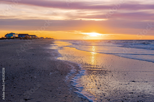 Wallpaper Mural Summer time on the beach - sun rising on serene beautiful beach with beach houses in the distant  Torontodigital.ca
