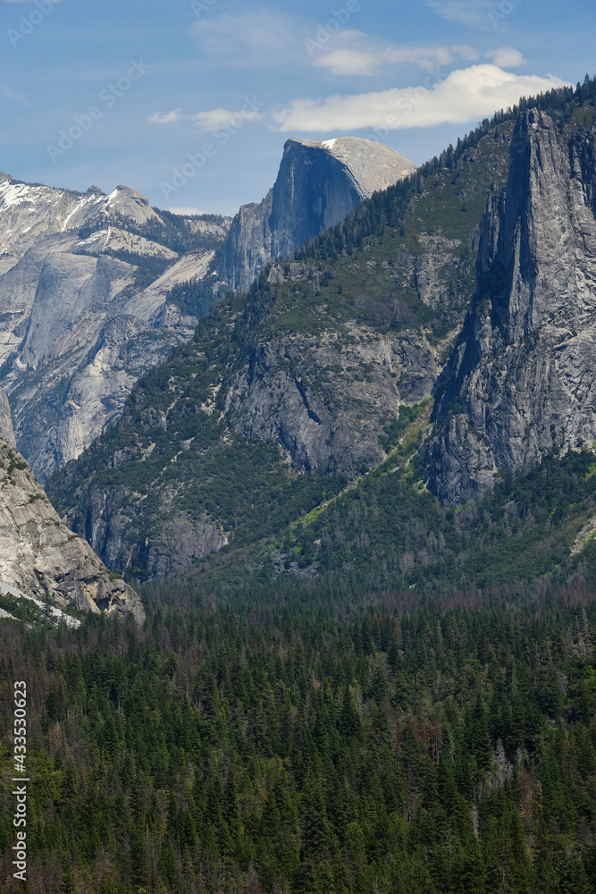 The Majestic Granite rock face of half dome  in the valley of Yosemite Natinal Park on a Spring day
