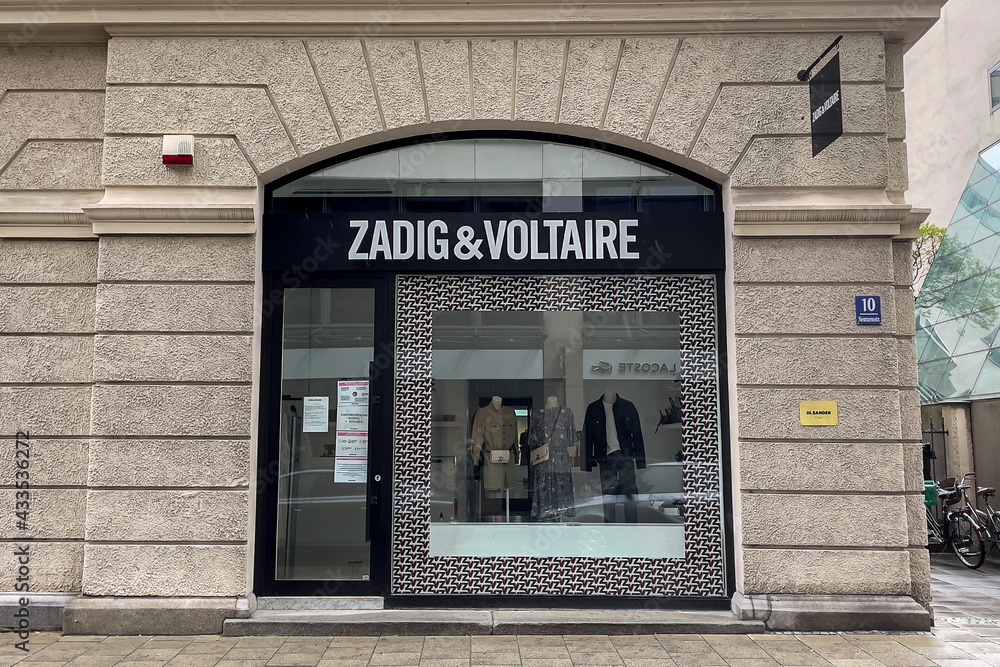 Zadig and Voltaire store sign in Munich town center Photos | Adobe Stock