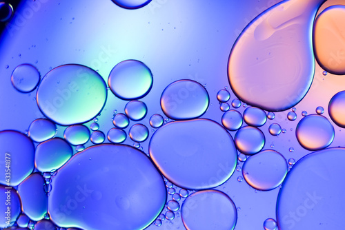 Colorful artistic of oil drop floating on the water. Abstract bubble background.