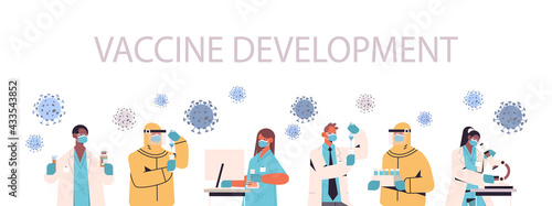 mix race scientists developing vaccine to fight against coronavirus researchers team working in medical lab