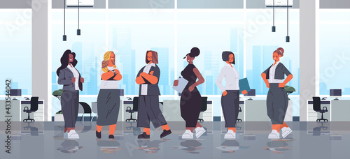 mix race businesswomen group standing together women's team business competition leadership concept