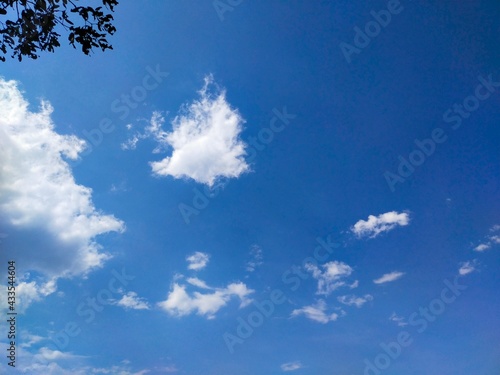 The sky has beautiful white clouds used in the design of destroying tiles, interior decoration.