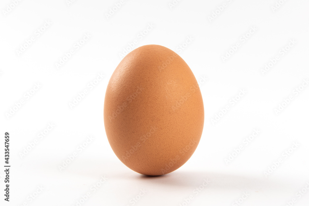 Raw brown chicken eggs on white background Raw brown chicken eggs on white background