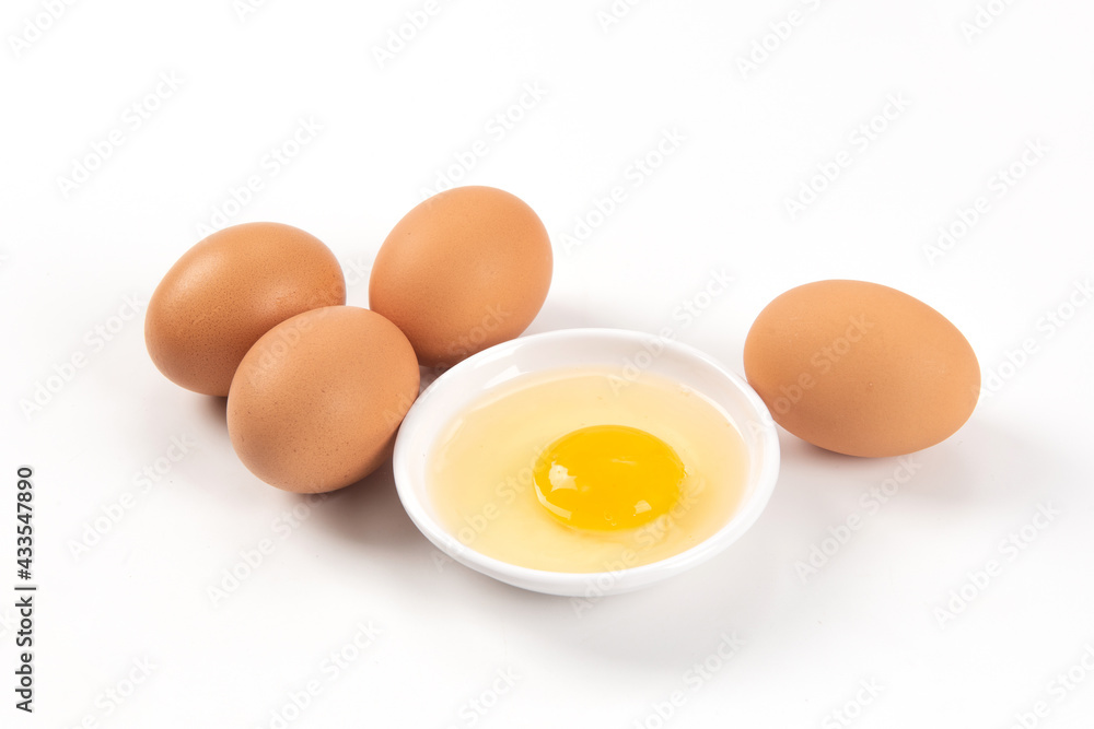 Raw brown chicken eggs on white background Raw brown chicken eggs on white background