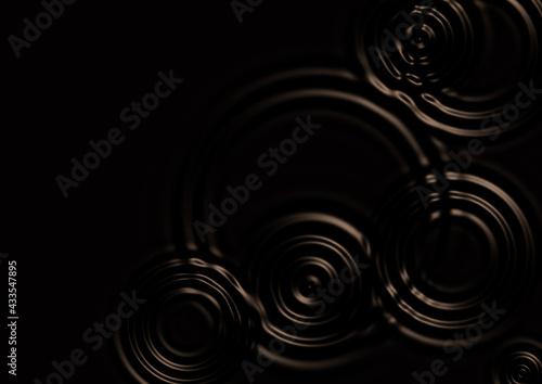 黒い水面に広がる波紋