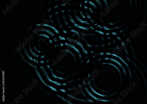 黒い水面に広がる波紋