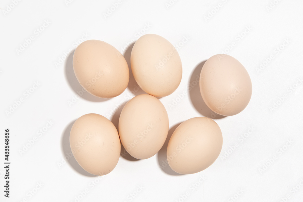 Raw native chicken eggs on white background Raw native chicken eggs on white background