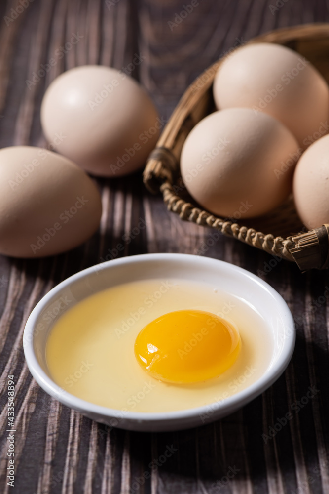 Fresh farm eggs on a wooden rustic background Fresh farm eggs on a wooden rustic background