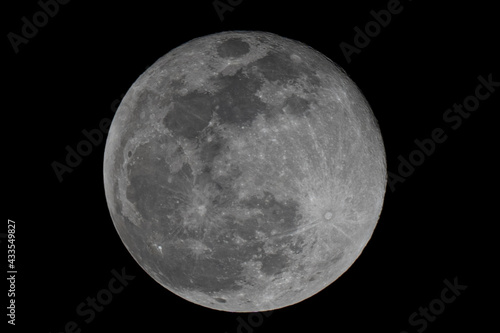 Full moon on night sky background, beautiful moon planet on space, close up view photo