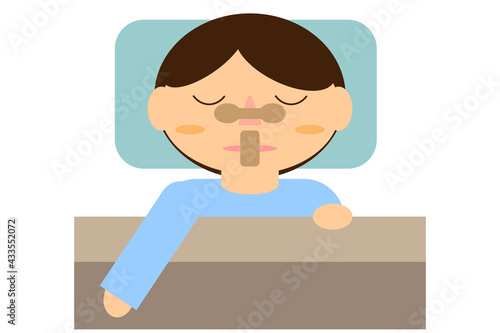 いびき防止のため鼻と口にテープを付ける人