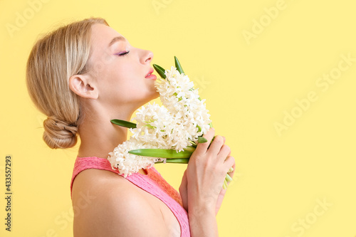 Beautiful young woman with ...