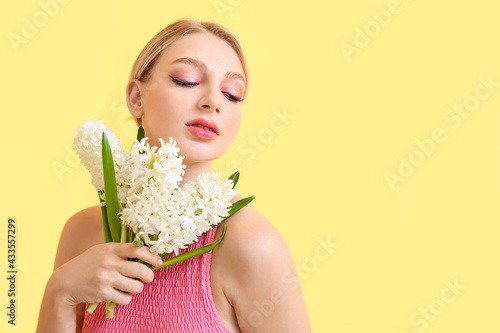 Beautiful young woman with ...
