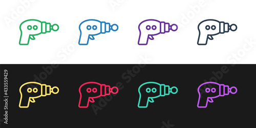 Set line Ray gun icon isolated on black and white background. Laser weapon. Space blaster. Vector