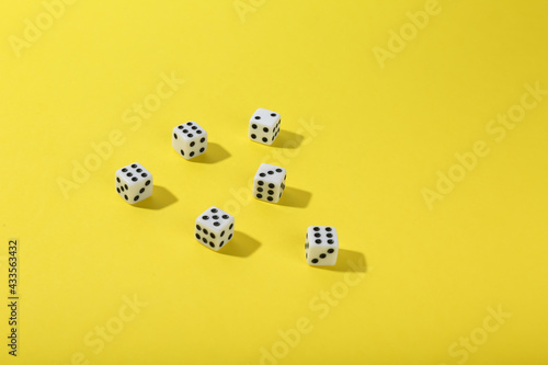 game dice on color background top view with copy space