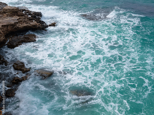 view of ocean waves and a fantastic rocky shore