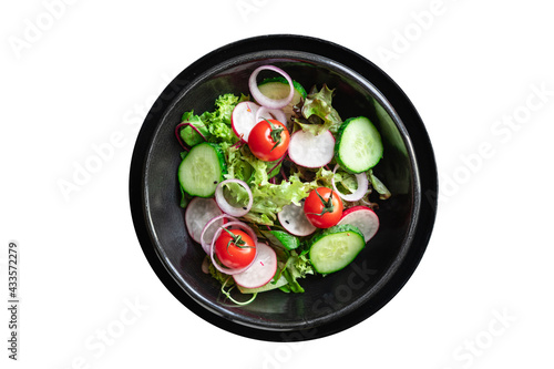vegetable salad radish, cucumber, mix leaves meal snack summer menu diet vegan or vegetarian food copy space food background rustic top view