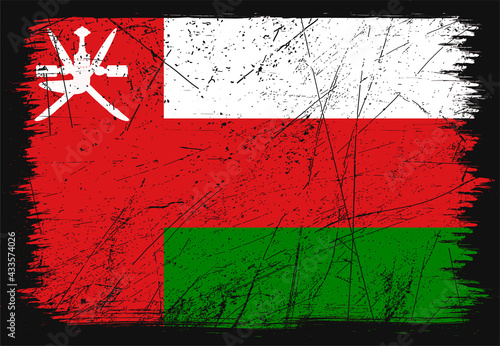 Creative grunge flag of Oman country. Happy independence day of Oman. Brush flag on shiny black background