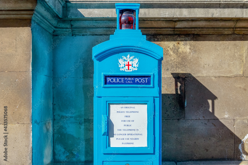 Old blue police public call post in the city of London Old blue police public call post in the city of London