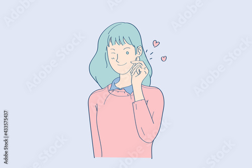 The cute girl with wink, blink and express mini heart of hand in happy emotional