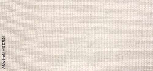 linen fabric or canvas texture natural. Textile white for background. Retro style..