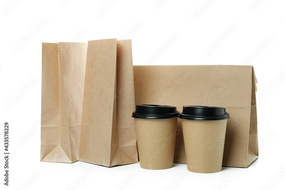 Paper cups and paper bags isolated on white background Paper cups and paper bags isolated on white background