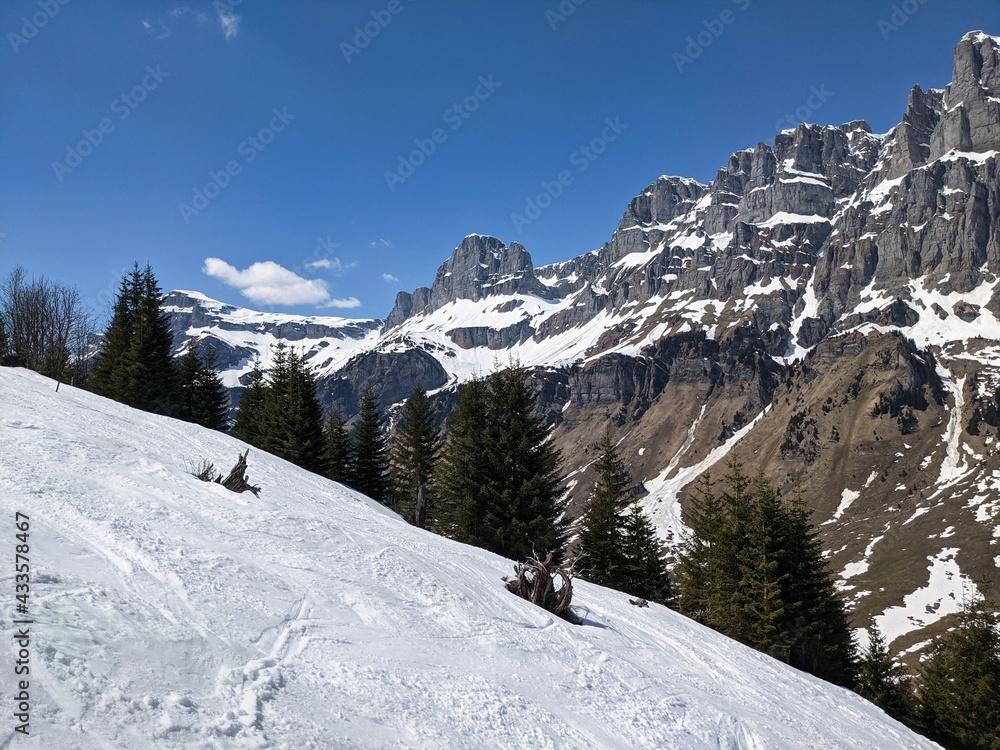 ski tour in the swiss mountains with a fantastic view of the snowy mountains. Urnerboden piz russein ski freeride