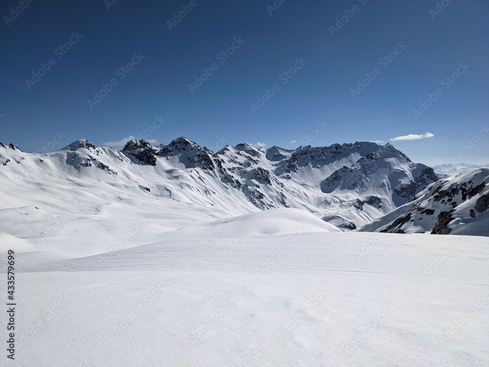  ski run from wiis platte near the swiiss austria border. Beautiful winter mountain landscape. Ski tour in dream weather
