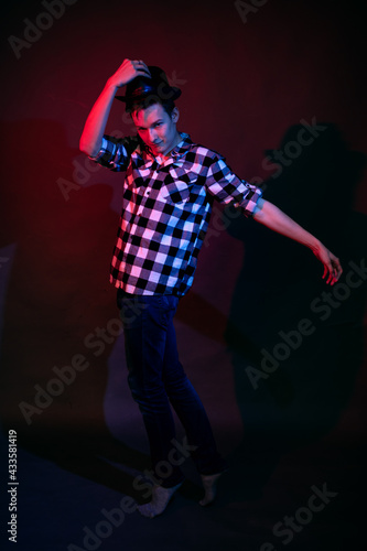 Dancing guy with red and blue light