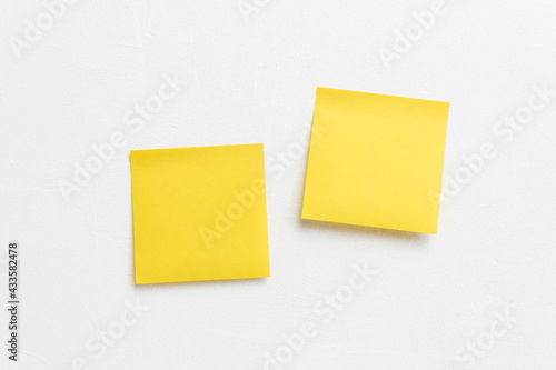 yellow sticky note on white
