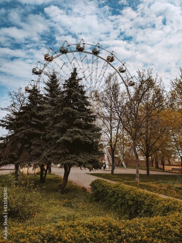 Kamenskoe, Ukraine - May 03, 2021: Ferris wheel in the central park photo