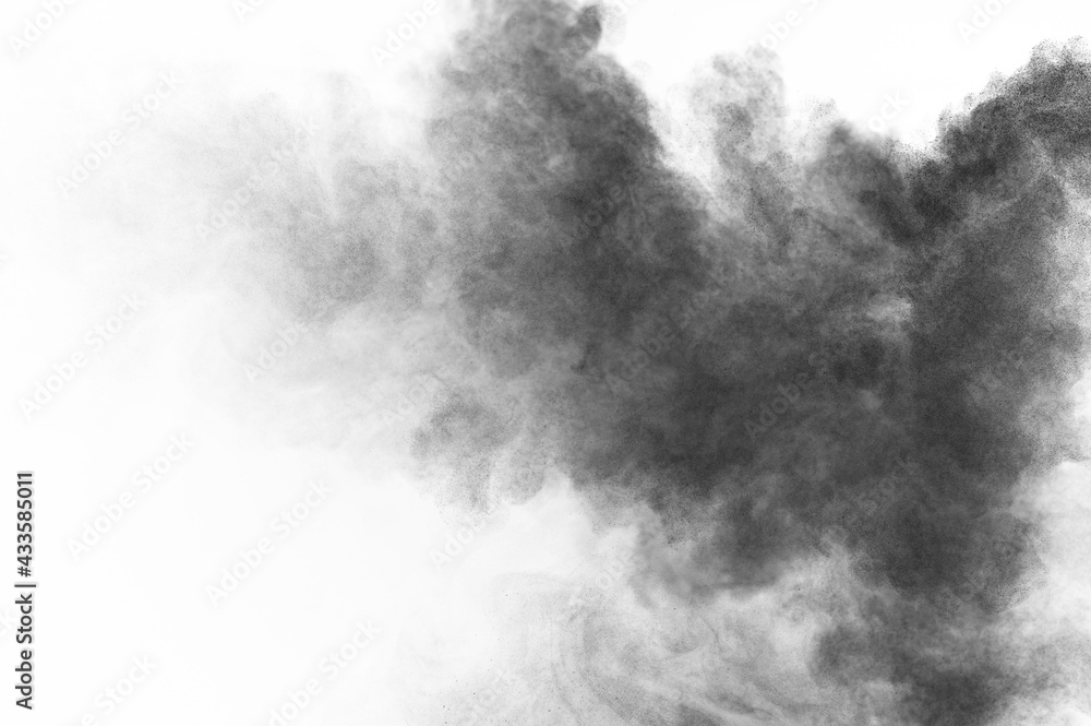Black particles explosion isolated on white background. Abstract dust overlay texture. Black particles explosion isolated on white background. Abstract dust overlay texture.