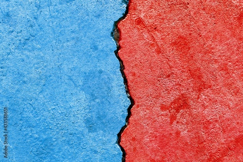Abstract Bipartisan politics election conflicts concept, blue vs red colors on cracked wall background, e.g., US, UK or EU political parties disagreement competition relationship photo