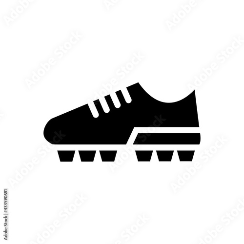 Football or Soccer Shoes icon in Glyph Style. The soccer player's shoes underneath were spiked. Vector illustration icons can be used for applications, websites, or part of a logo.