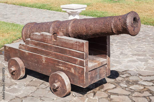 Ancient ship cannon, close-up photo