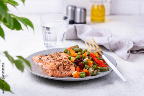 Baked salmon with boiled vegetable