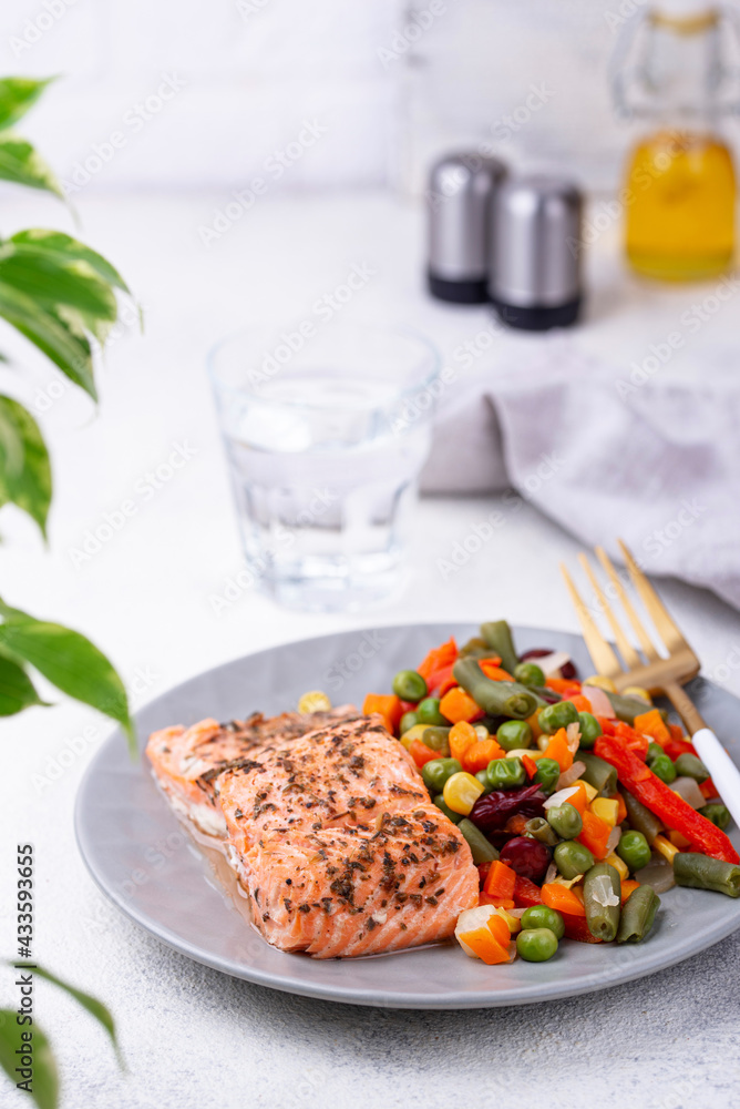 Baked salmon with boiled vegetable