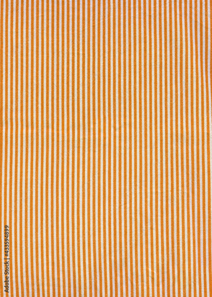 Obraz premium Orange striped tablecloth background texture
