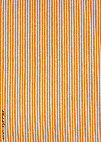 Orange striped tablecloth background texture